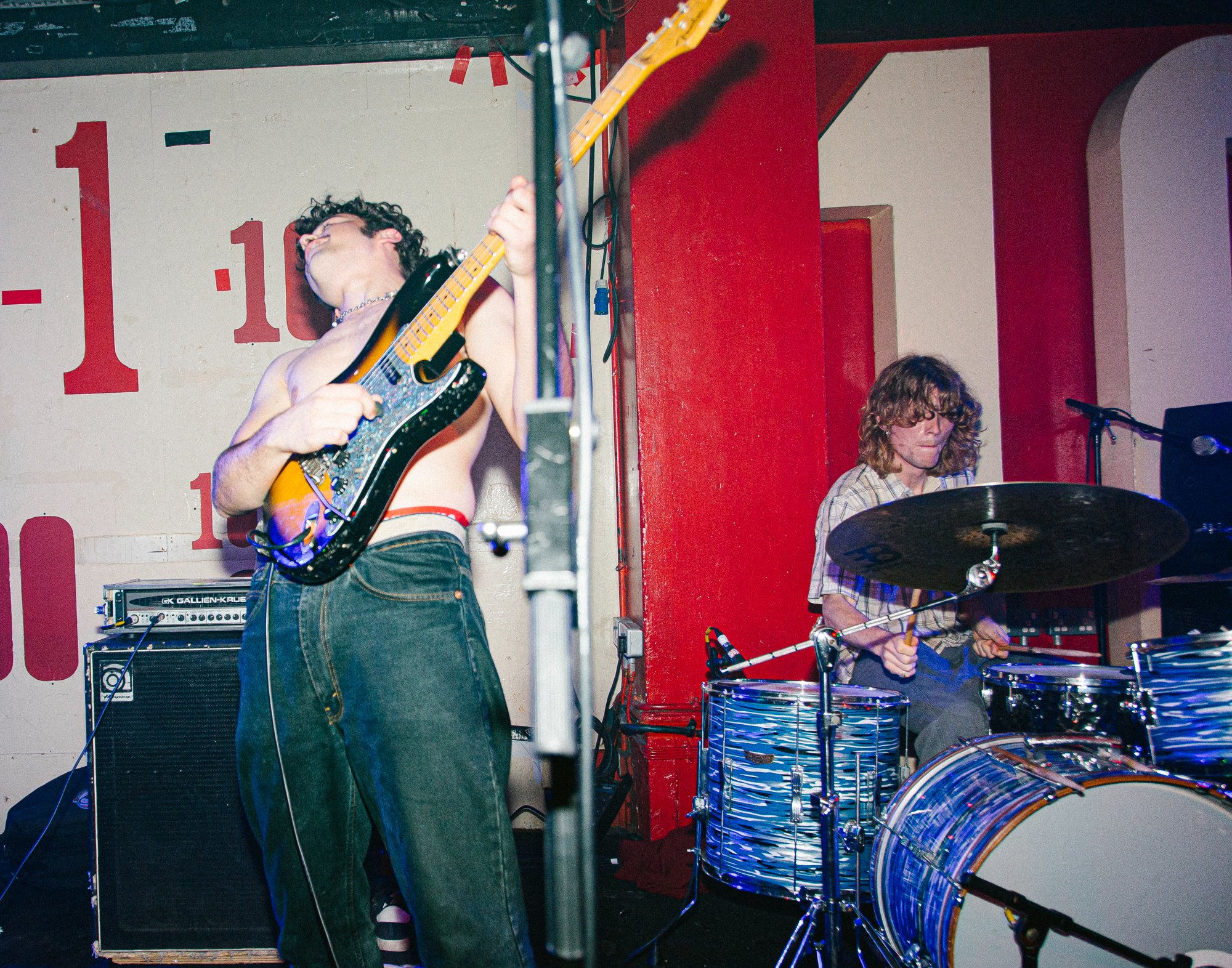 Townhouses performing live at the 100 Club, London — guitarist and drummer on stage