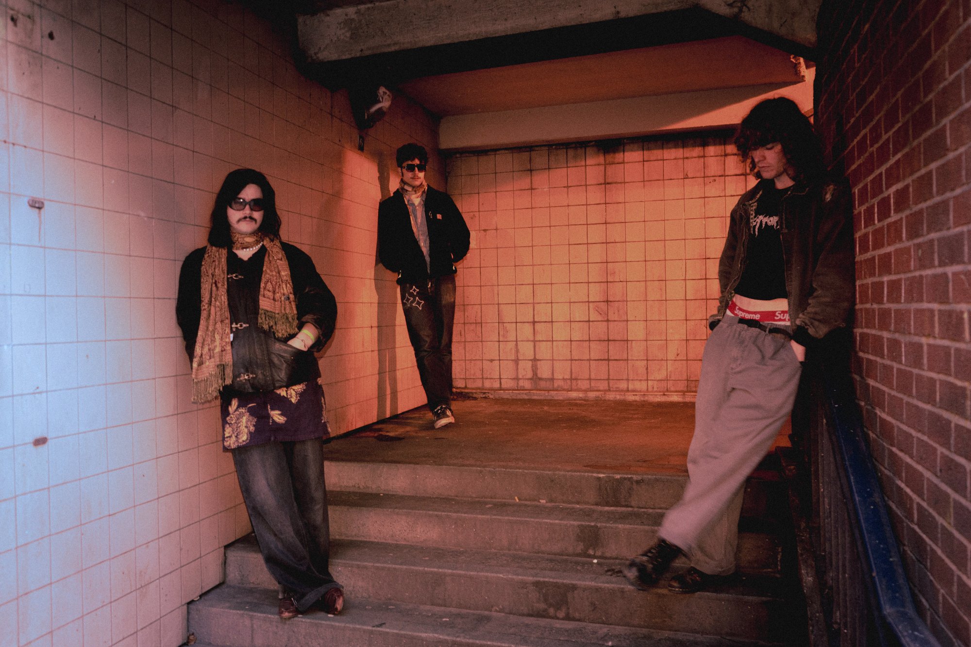 Townhouses looking moody in a tiled underpass before the big show